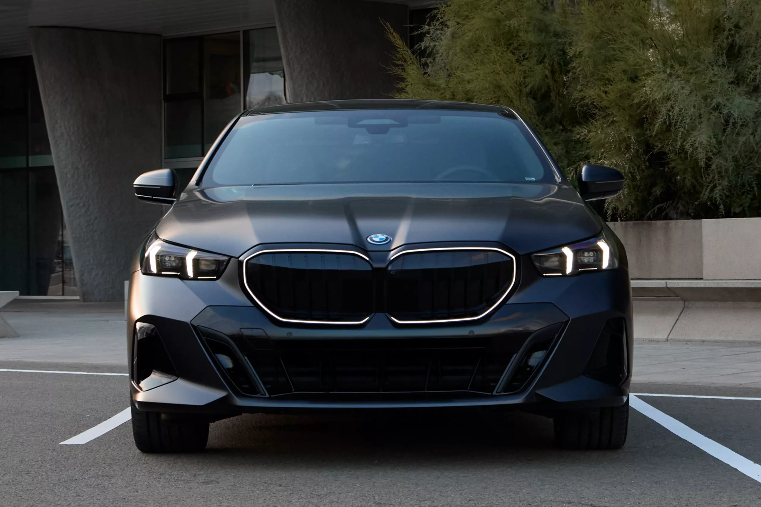 Exterior Illuminated Bmw Kidney And Headlights Of The Bmw 5 Series Sedan Plug In Hybrid