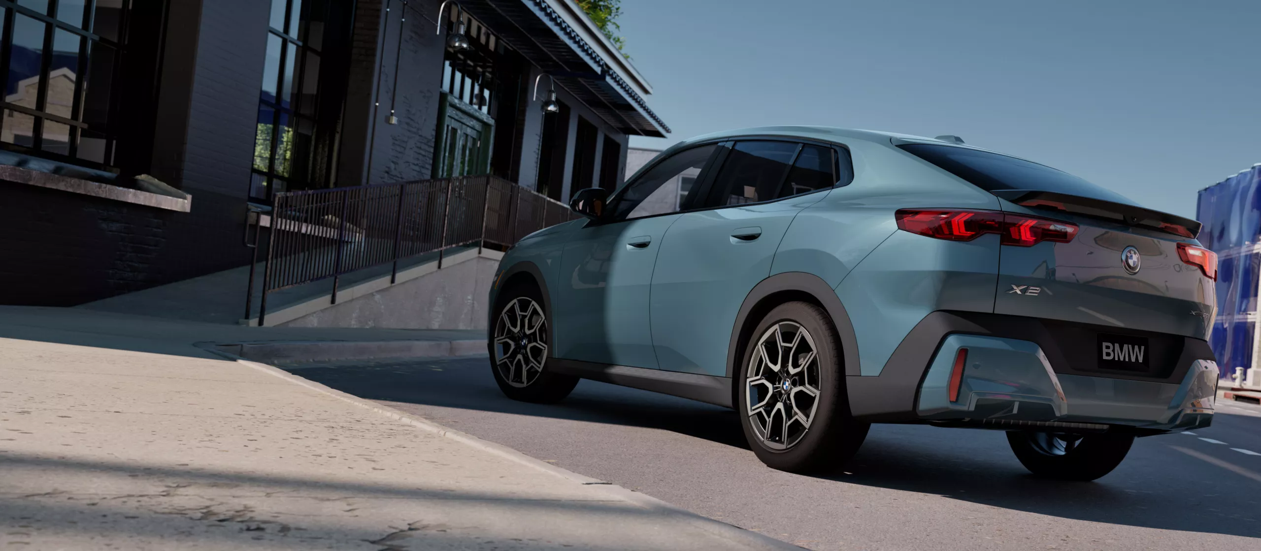 Exterior Exterior View Of The Bmw X2 Parked In An Urban Environment In Front Of An Office