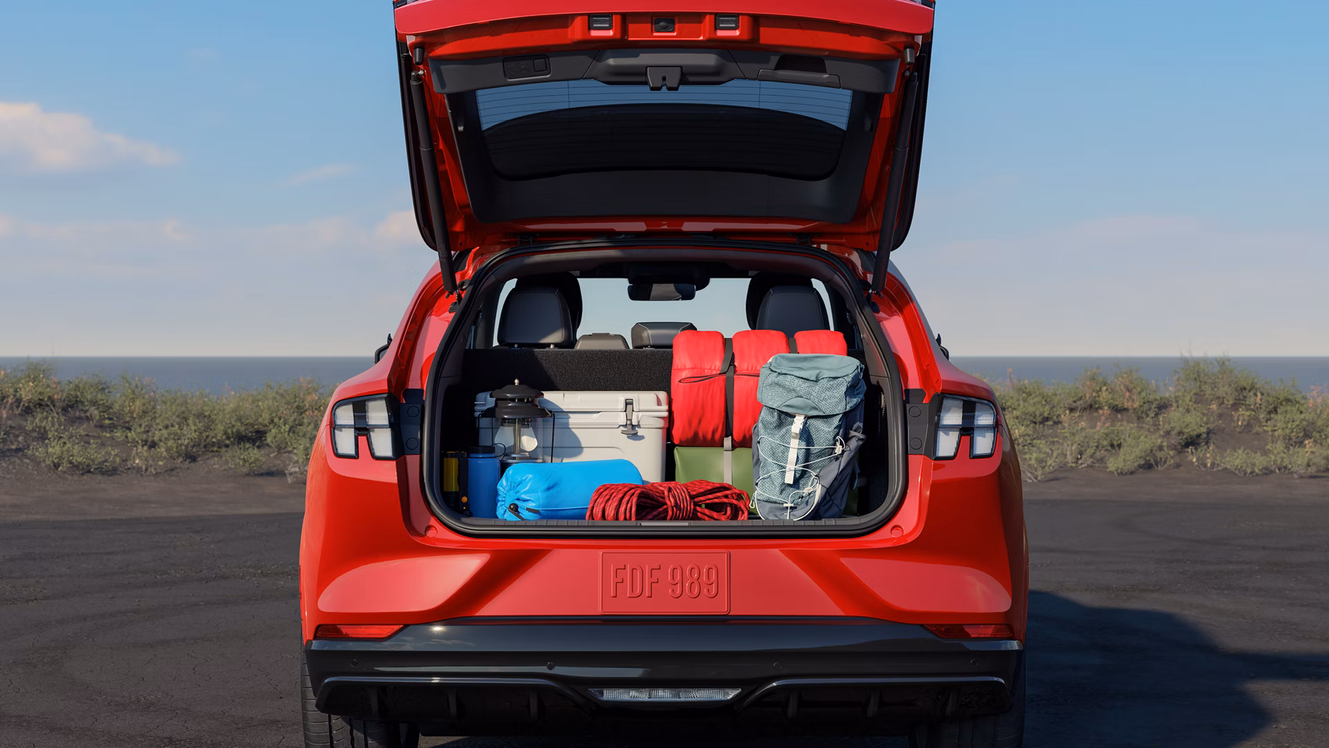 Interior Back Cargo Area Of The 2026 Ford Mustang Mach E Suv Filled With Items