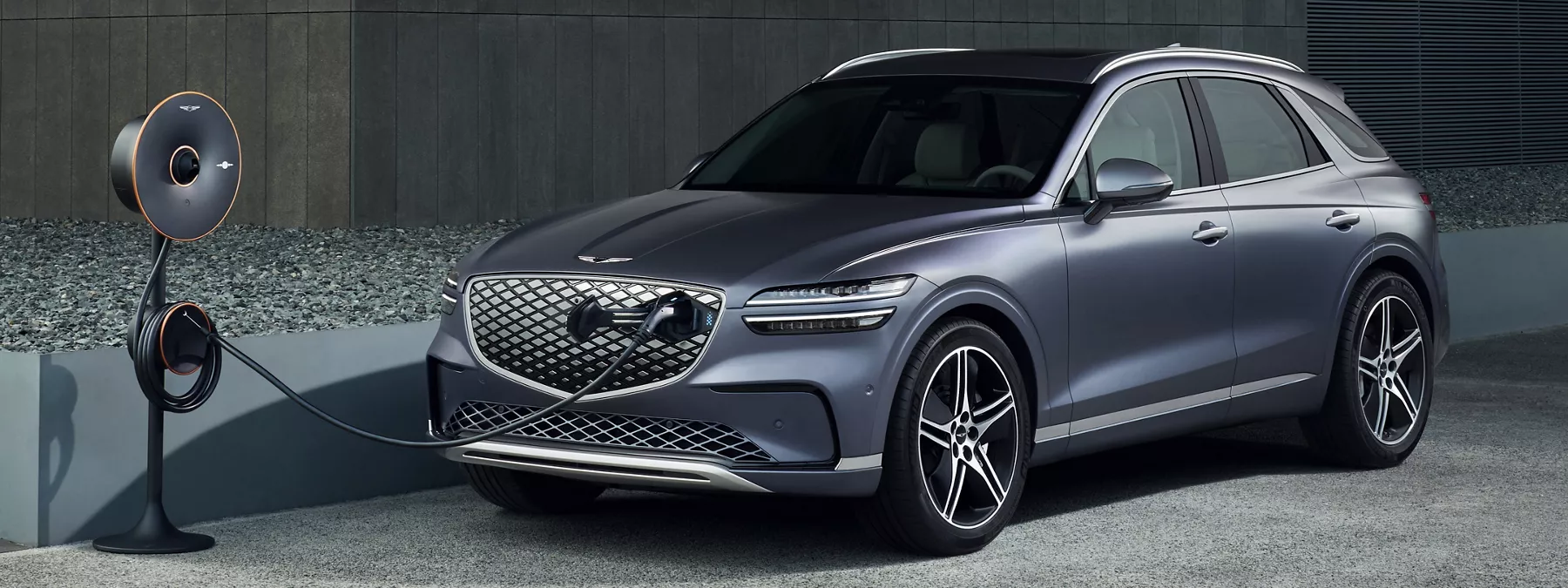 Exterior Front Driver Side View Of Genesis Electrified Gv70 Connected To