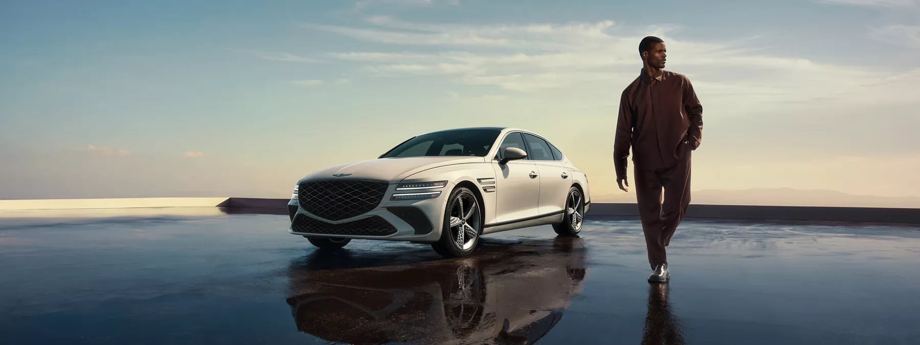 Exterior 3 4 Front Driver Side View Of Genesis G80 In Vatna Gray Parked O