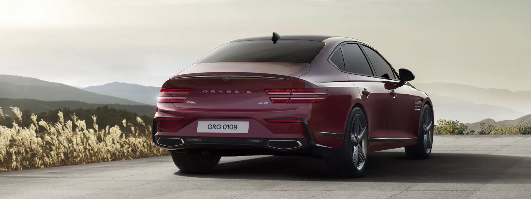 Exterior 3 4 Rear Passenger Side Angle Of Genesis G80 In Cavendish Red Dr