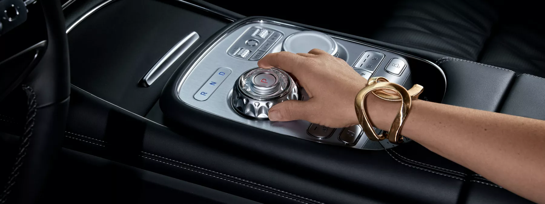 Interior Closeup Of 2026 Genesis G90 Interior In Black Monotone With Hand