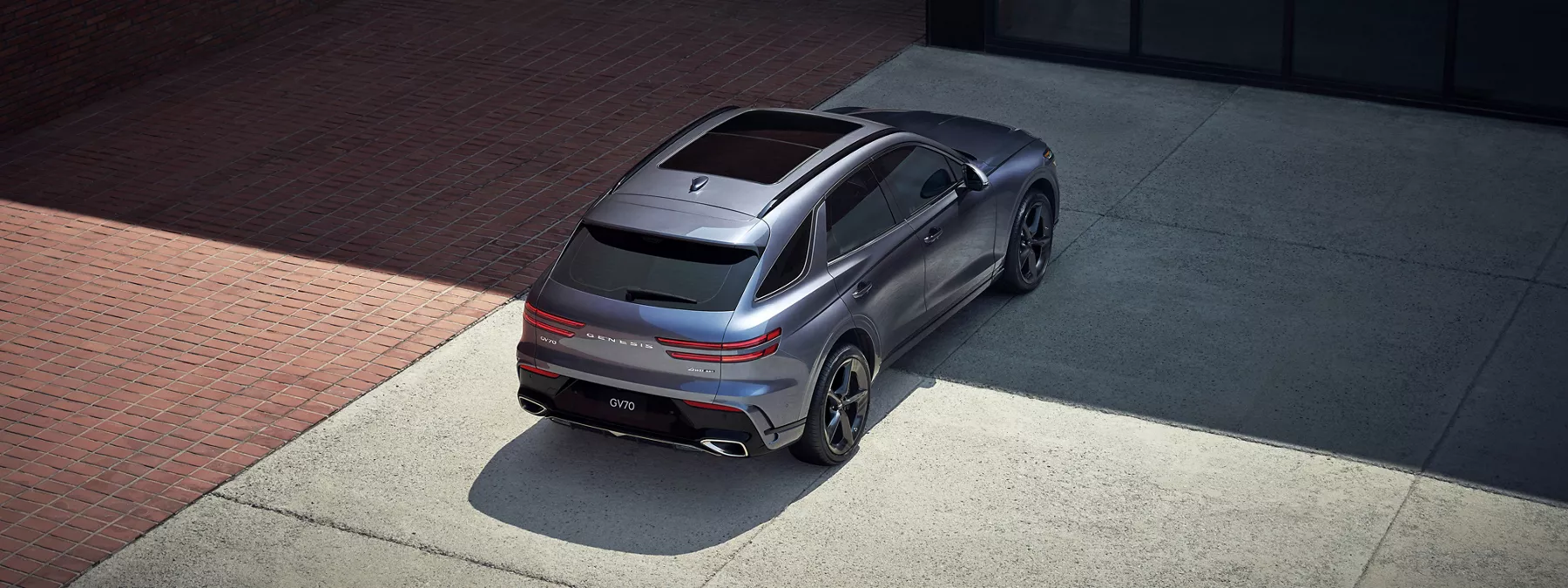 Exterior High Angle 3 4 Rear Passenger View Of 2026 Genesis Gv70 Parked I